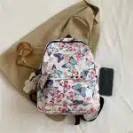 Butterfly Print Backpack with Soft Plush Charm